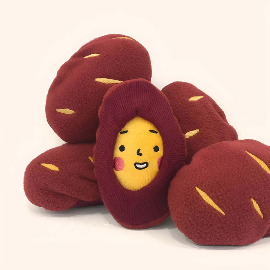Red sweet potato shaped pet hidden food toy with treat pocket for slow feeding