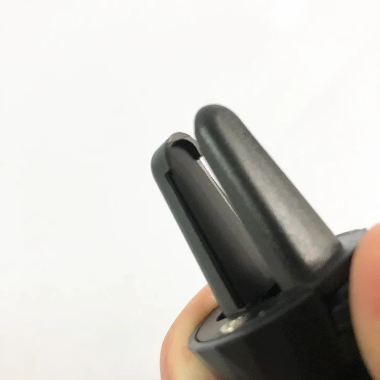 Glory black car phone holder attached to a car air vent