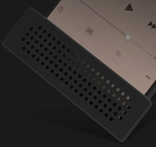 A portable black ABS plastic mobile phone amplifier bracket holding an iPhone.