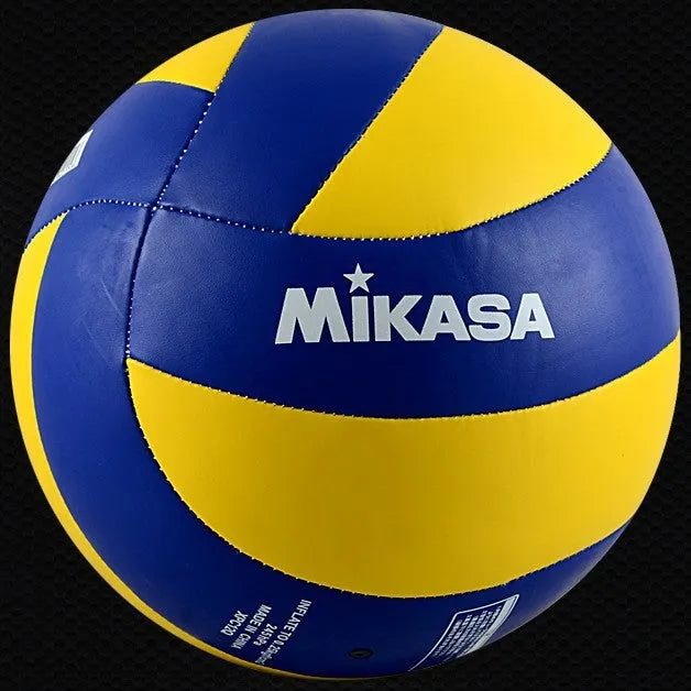 Machine sewn PU volleyball in hand on outdoor court – available in No.4 and No.5 sizes for junior and senior play