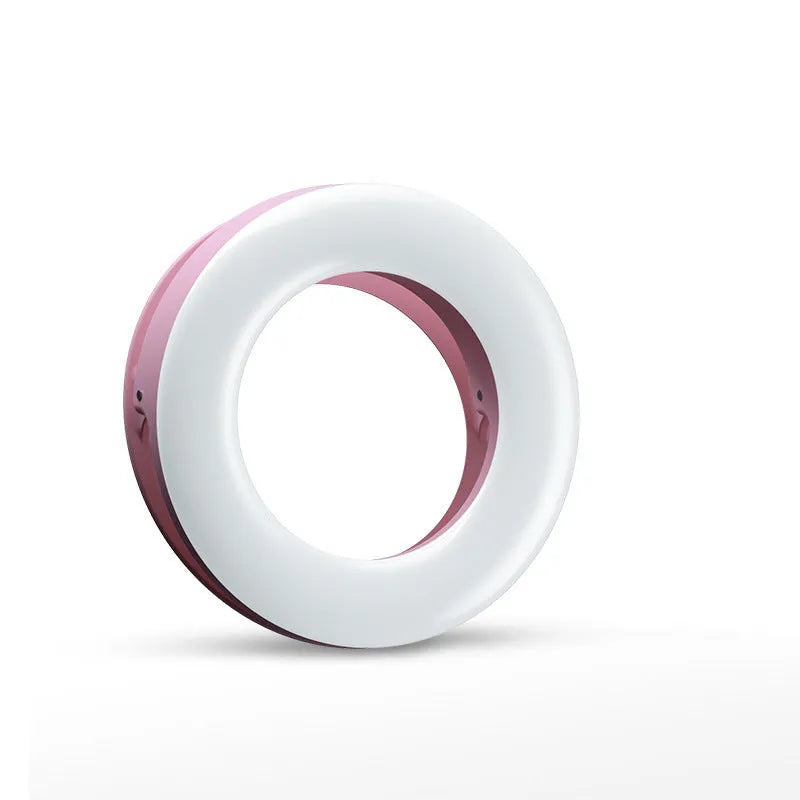 Compact black LED selfie ring light with USB cable for mobile phone photography.