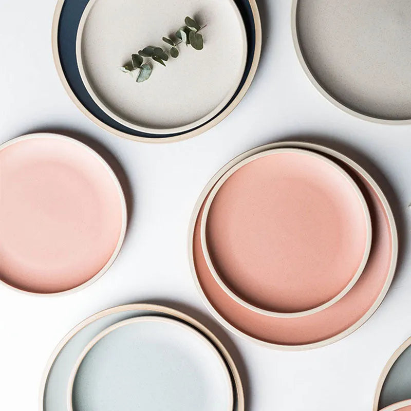 Pure blue matte finish 10-inch ceramic dinner plate on a table.