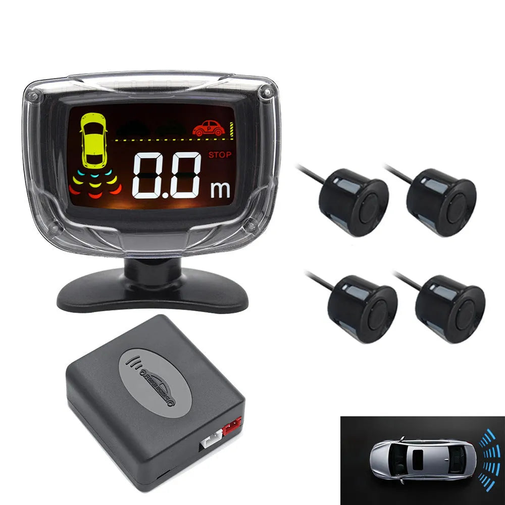 Wireless reversing sensor kit showing main unit, four round probes, LED display, hole opener, and cables on a white background.