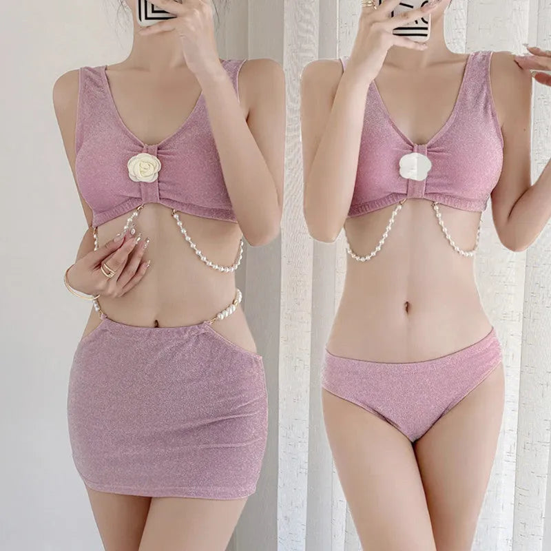 Bear Vacation brand three-piece bikini swimsuit for women in pink or black, showing briefs and sleeveless top.