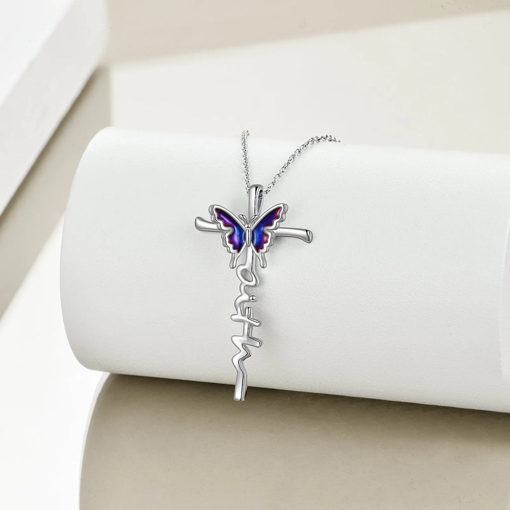 Sterling silver butterfly cross pendant necklace on white gold plated cable chain