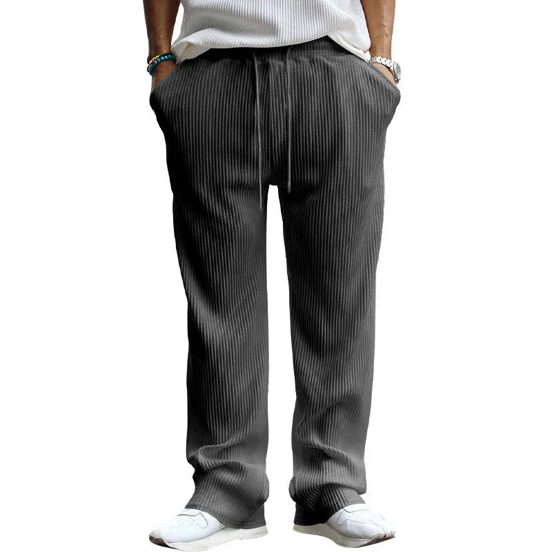 Men's straight-leg casual trousers in Army Green colour, showing high waist and loose fit.