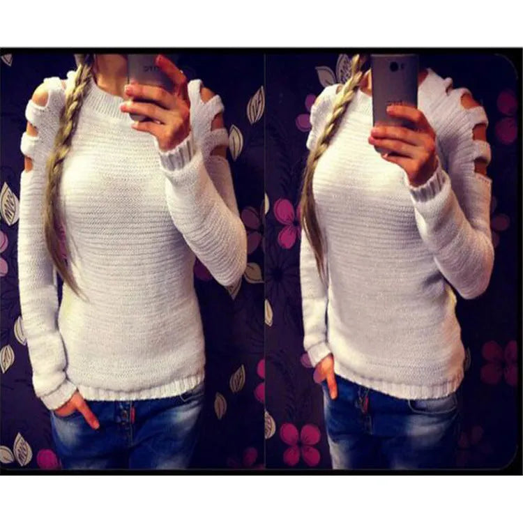 Women's grey knitted pullover shirt with crocheted hollow-out patterns on the sleeves and body.