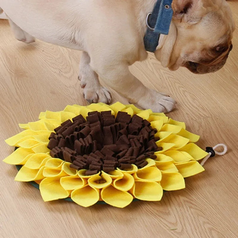 Yellow sunflower-shaped dog snuffle mat with fabric folds for hiding treats.