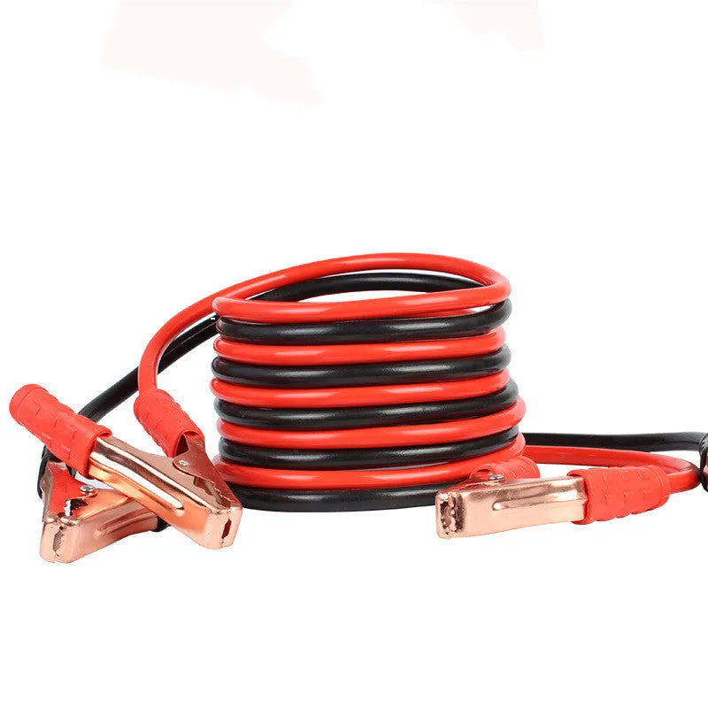 Black and red car battery jumper cables with clips for emergency vehicle jump-starting
