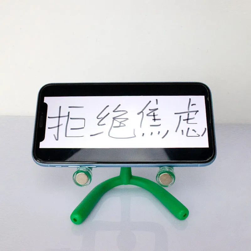 Green plastic decompression toy figure in iron box with reject anxiety text, for desk decoration and stress relief
