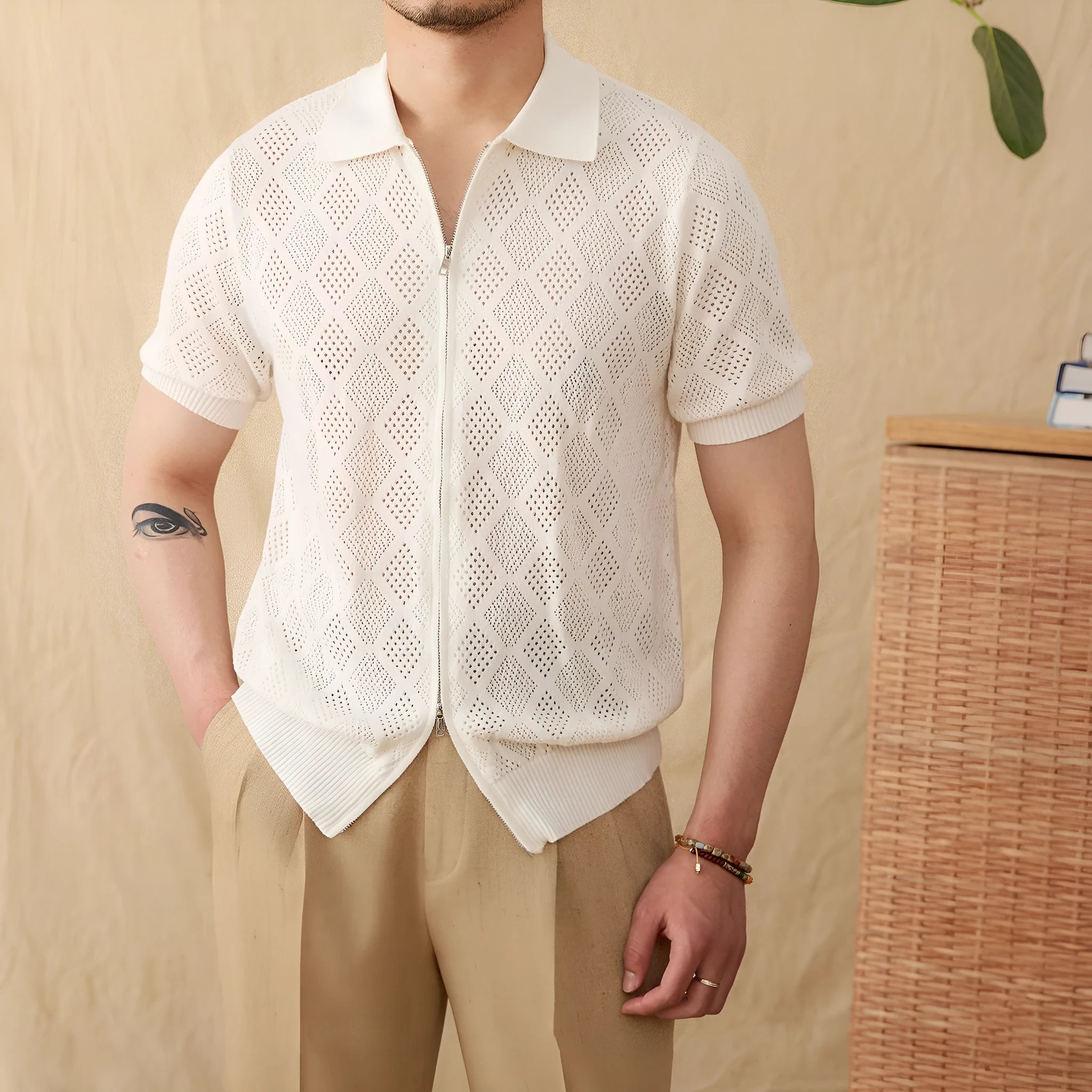Light coffee coloured cotton cardigan with zip front closure and lapel collar showing short sleeve design