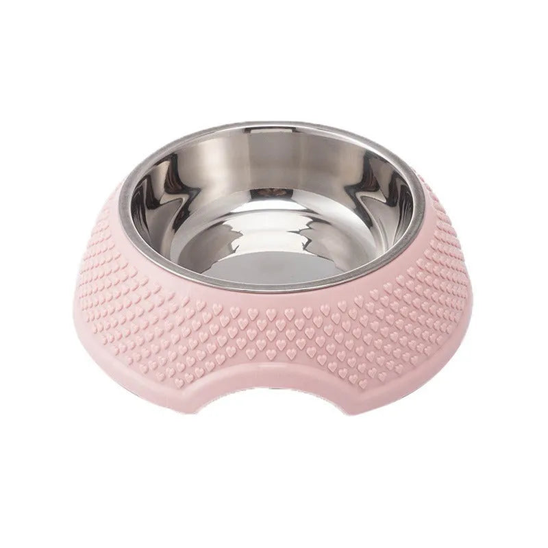 Blue stainless steel pet bowl with non-slip base on a table