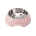 Blue stainless steel pet bowl with non-slip base on a table
