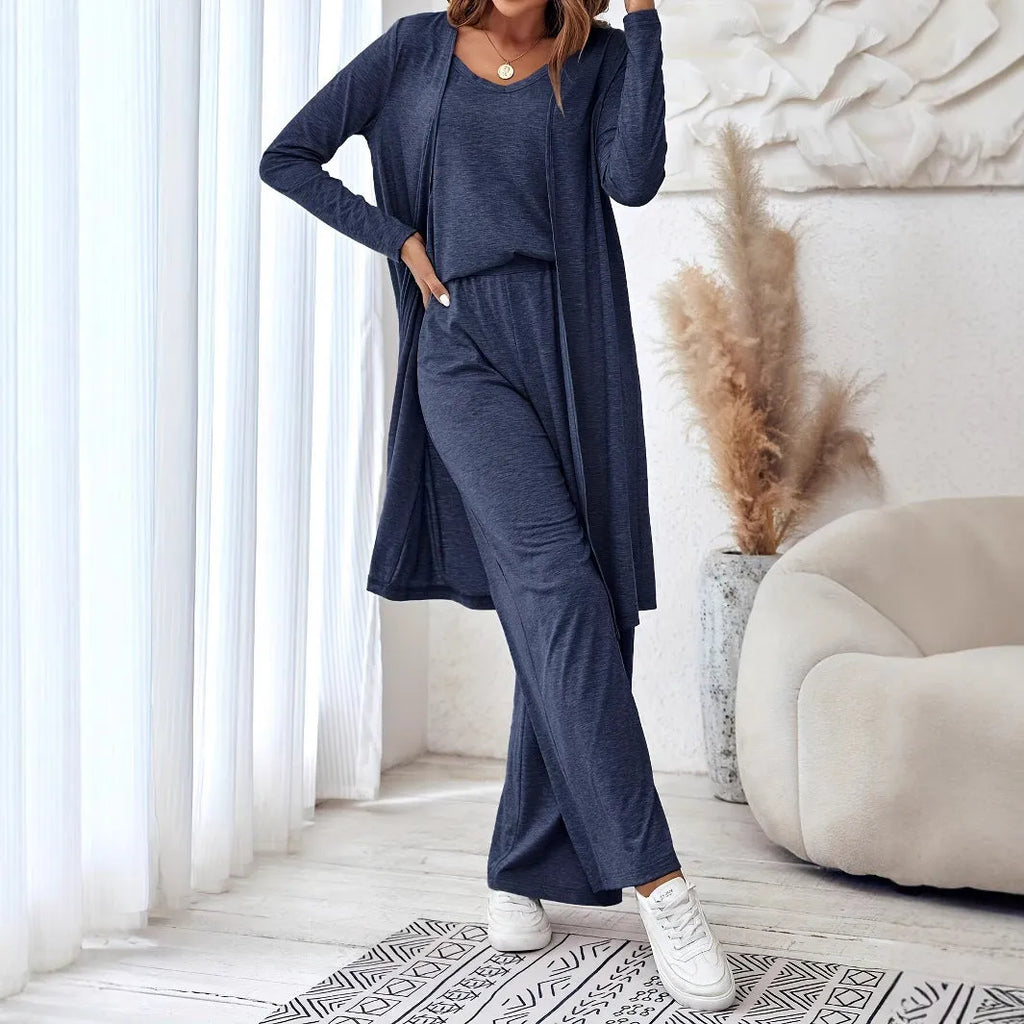 Blue women's three-piece casual suit with sling top, cardigan, and trousers