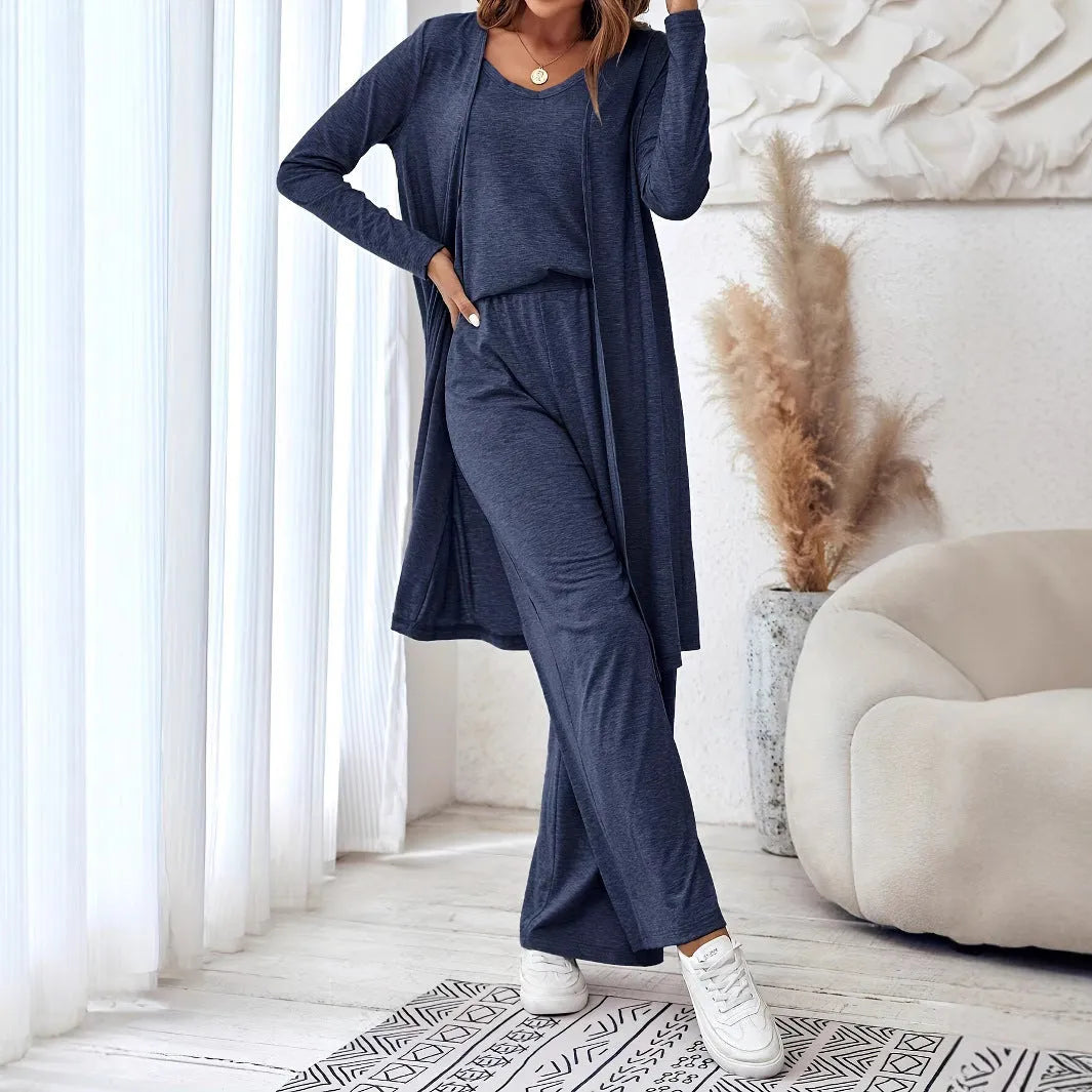 Blue women's three-piece casual suit with sling top, cardigan, and trousers