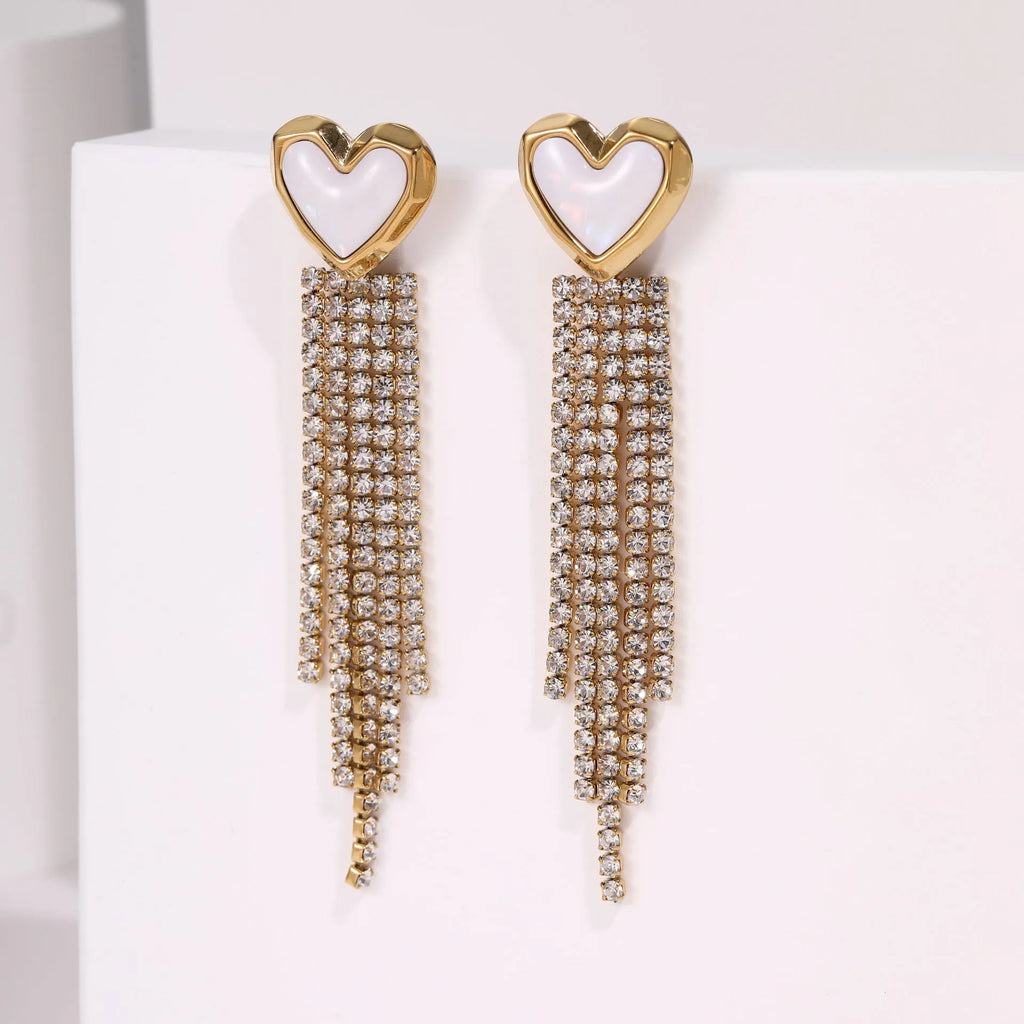 Stainless steel earrings with diamond tassel designs in heart, star and geometric shapes with 18K electroplated finish