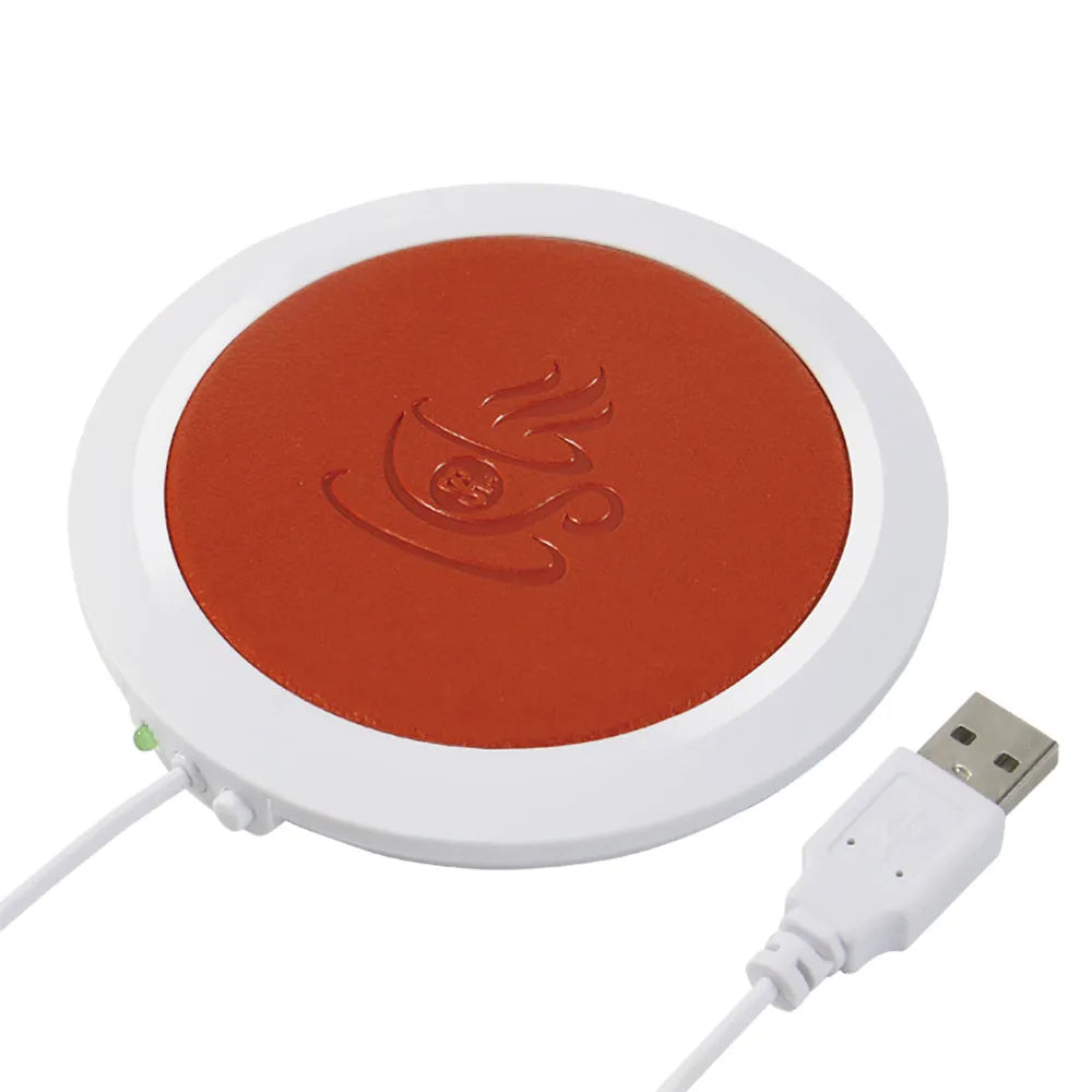 USB heating coaster in black, blue, and orange colours showing USB cable connection