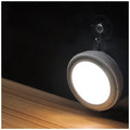 Compact round white motion sensor LED light with infrared sensor for wardrobes and corridors.