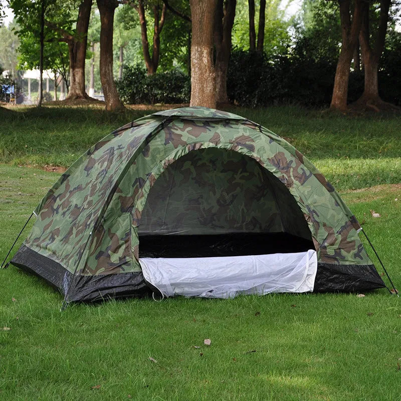 Green digital camouflage outdoor tent with fibreglass poles setup in woodland environment