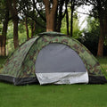 Green digital camouflage outdoor tent with fibreglass poles setup in woodland environment