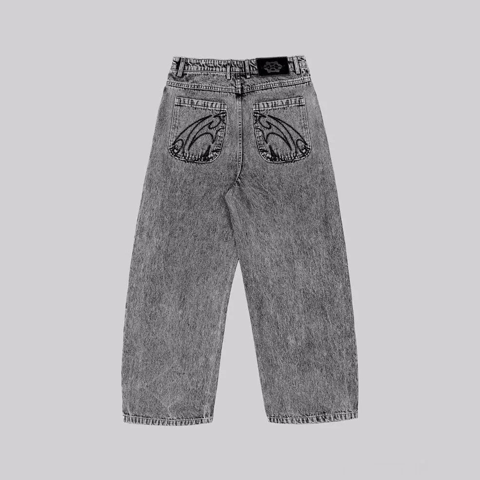Grey loose-fit straight-leg cotton denim trousers on a hanger.