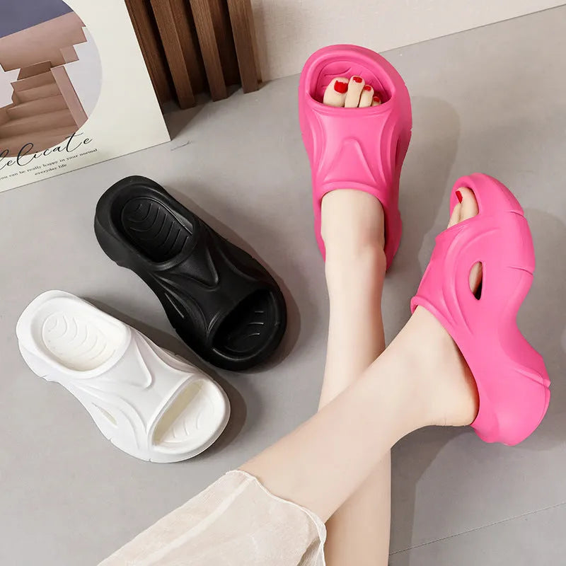 Women's thick-soled EVA slippers in white, black and rose red colours for outdoor beach wear