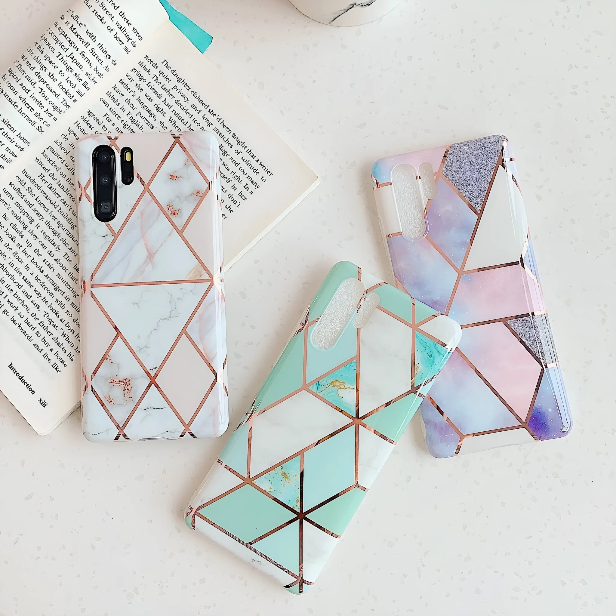 Electroplated marble finish TPU back cover case for Huawei and Samsung smartphones in multiple colours.