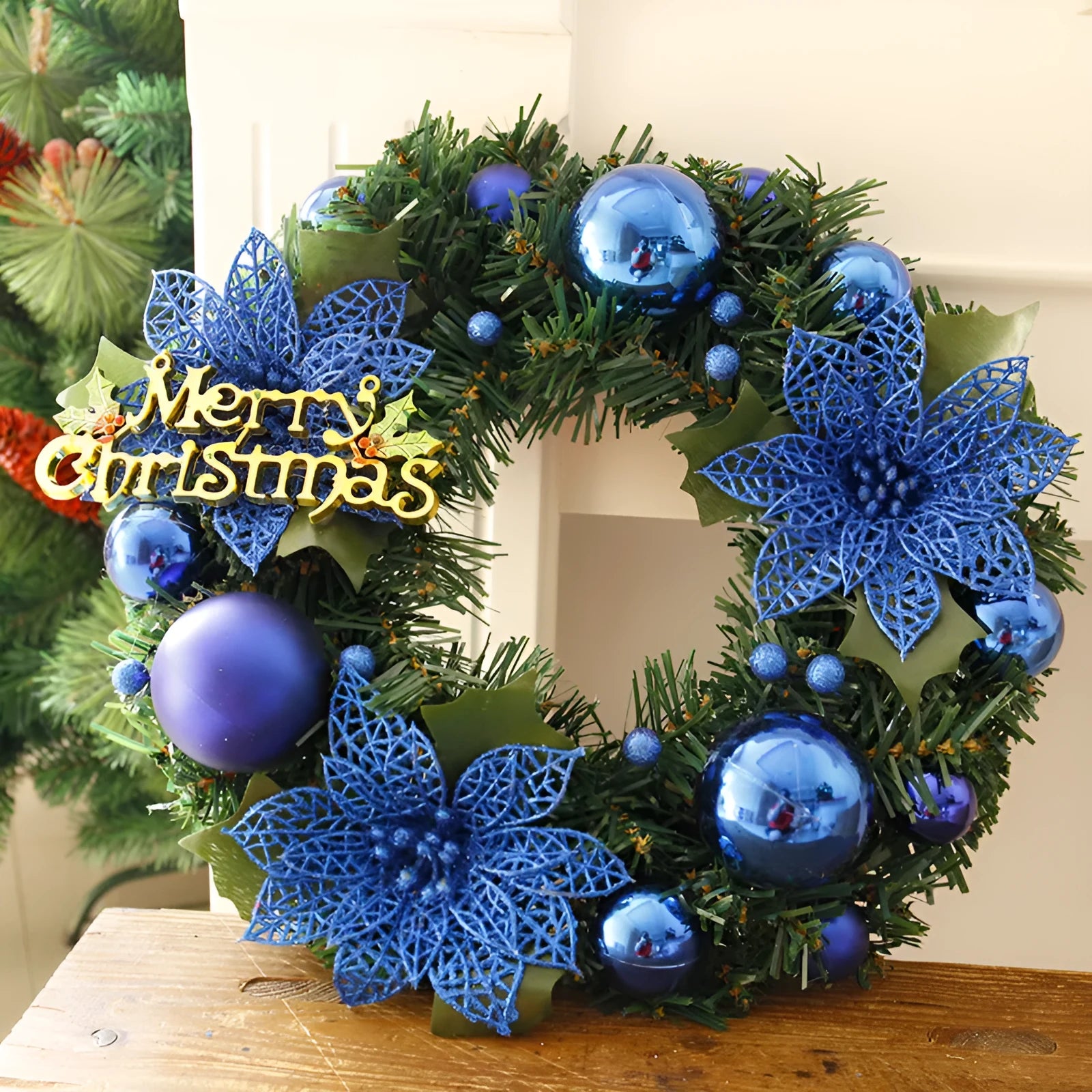 30cm multicolour plastic Christmas wreath in red, gold, silver, blue, pink or purple on a door.