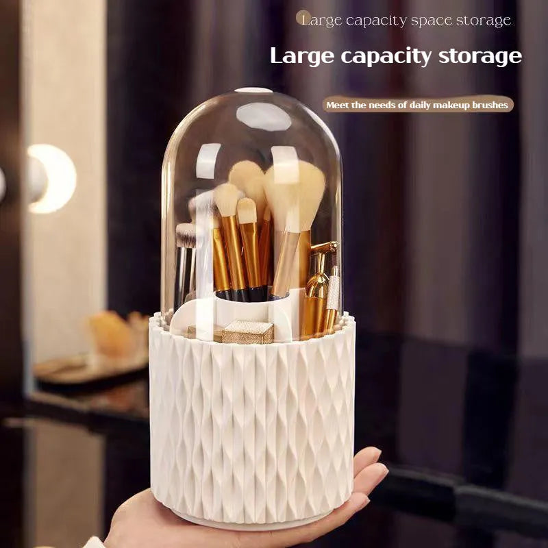 White rotating transparent makeup brush storage tube with dust cover lid on desktop