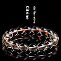 Natural citrine scattered beads ball bracelet in 7A grade, shown in gold and amber tones with textured bead design.
