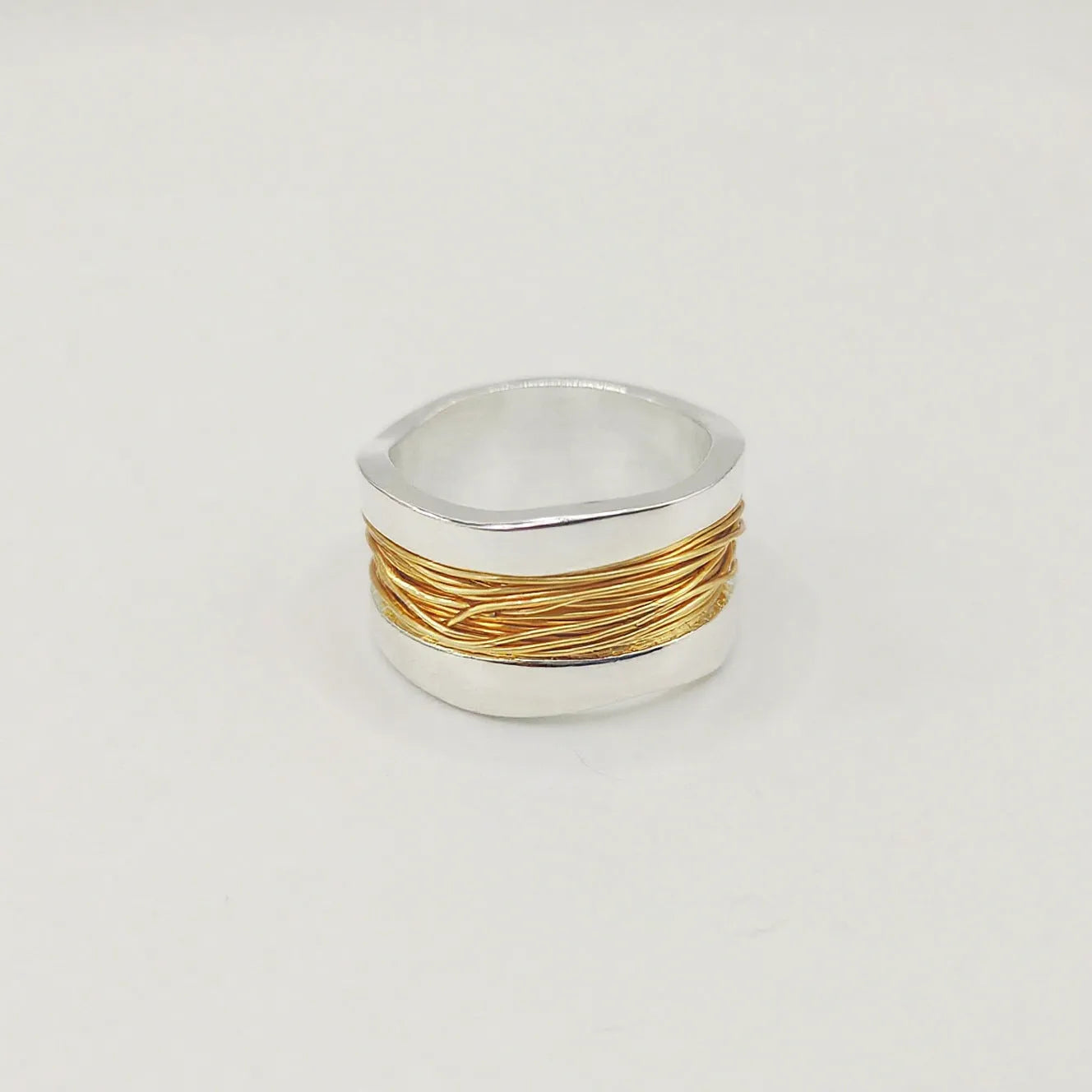 Hand-wound real copper wire wide surface bracelet in two-tone geometric design, electroplated finish