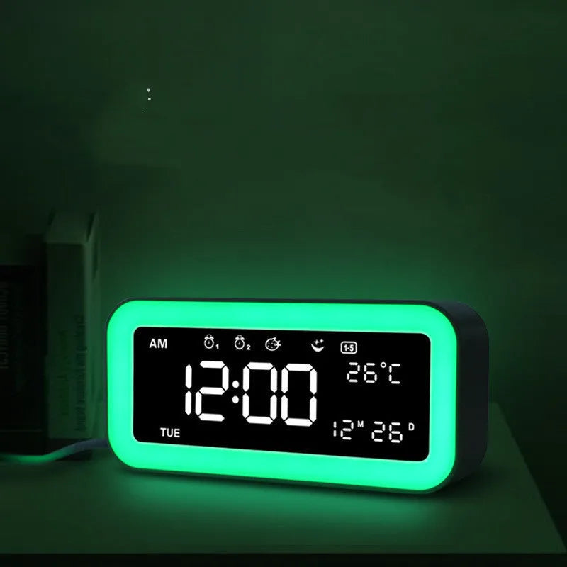 Rectangular digital alarm clock with LED atmospheric lighting and music function in blue colour option