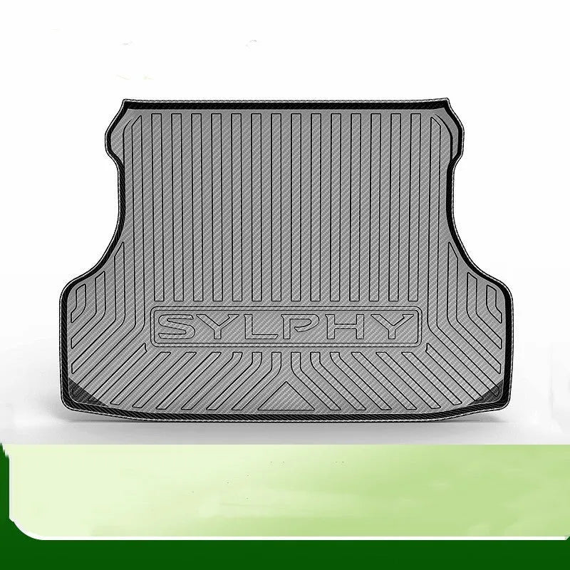 Black carbon fibre pattern TPE rubber boot liner mat for a car trunk.