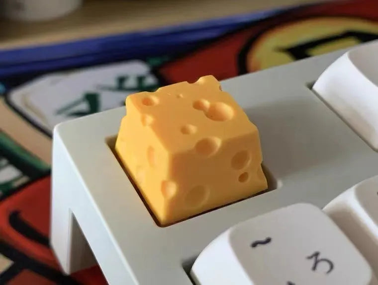 Yellow resin cheese wedge key cap for mechanical keyboards with detailed sculpting