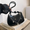 Women's one shoulder crossbody commuter bag in white, horizontal square PU leather with chain detail