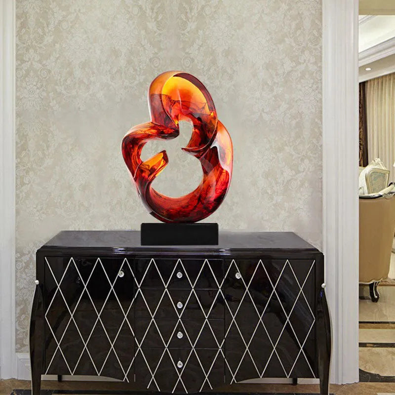 Transparent resin ornament in modern style showing blue or orange red colour option