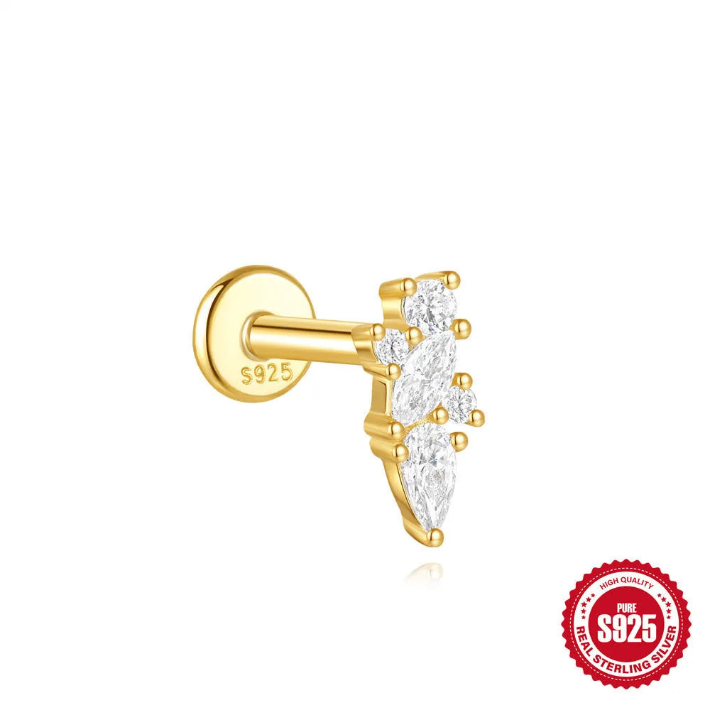Geometric kite-shaped sterling silver stud earrings with rhinestones and a gold chain tassel.