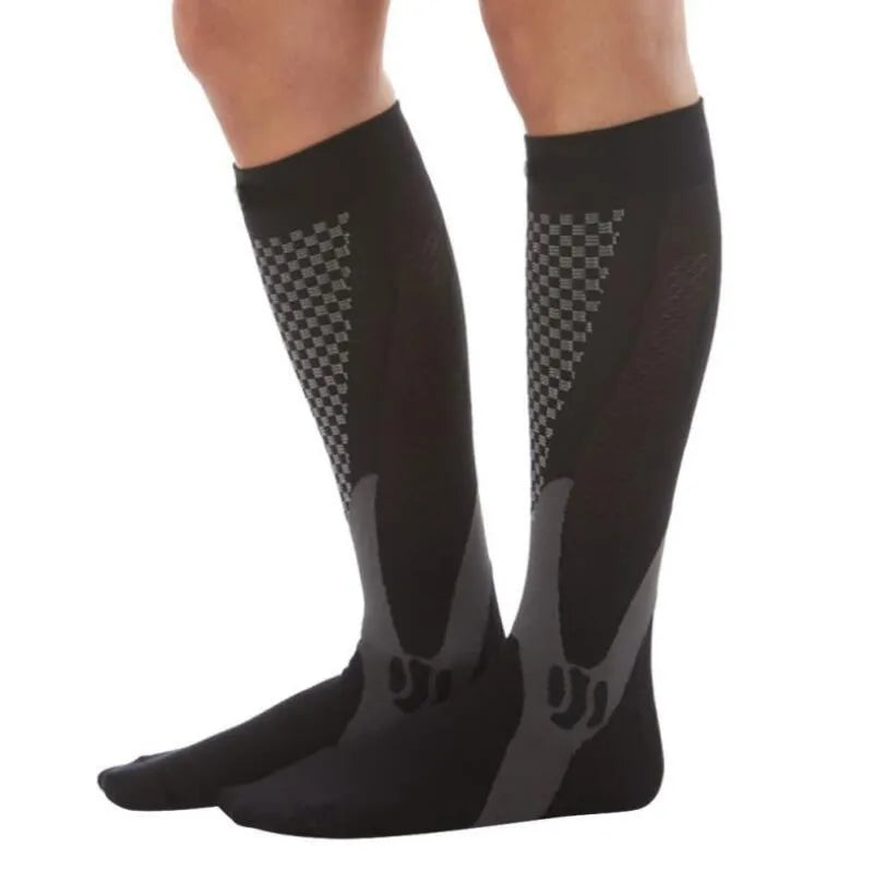 Graduated compression socks in black, shown with size guide for S/M, L/XL, and XXL.