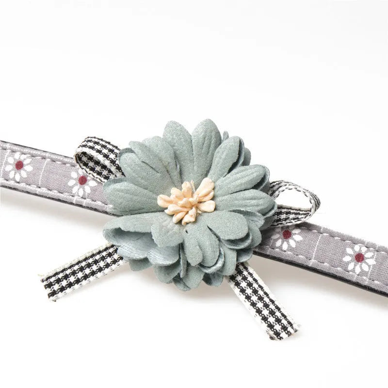 PU pet collar with cute floral pattern in pink, adjustable buckle, size options for small to large dogs and cats