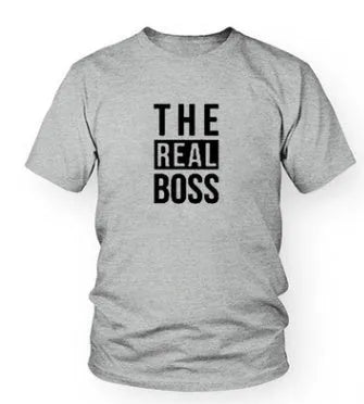 Man wearing a loose fit round neck short sleeve T-shirt with a graphic print design.