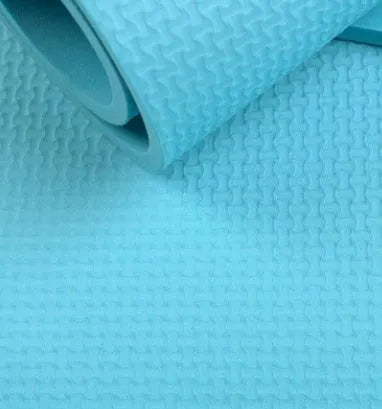 EVA yoga mat in blue showing thickness options of 4mm and 6mm with non-slip texture