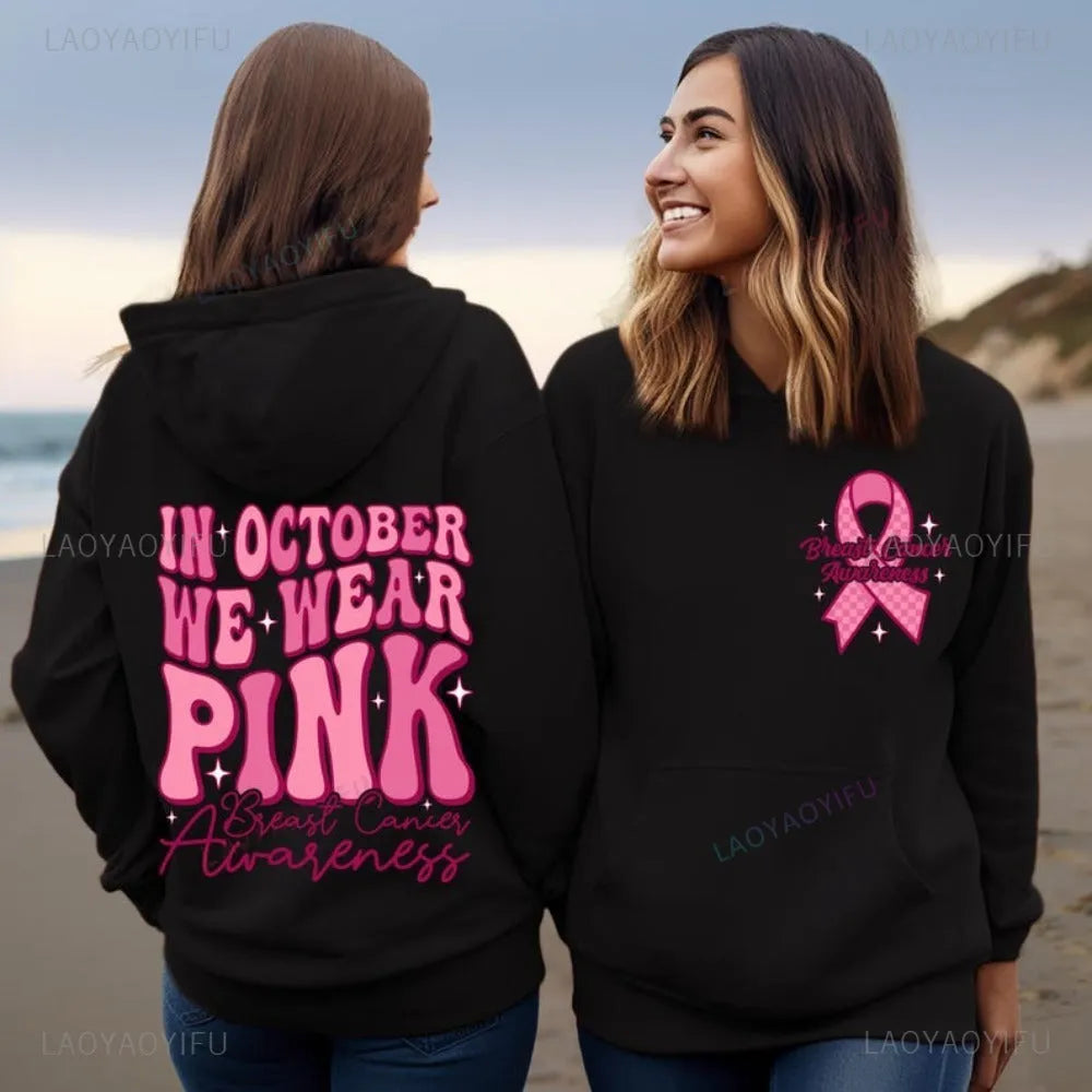 Women's pink Breast Cancer Awareness pullover hoodie with retro hot stamp print and side seam pockets.