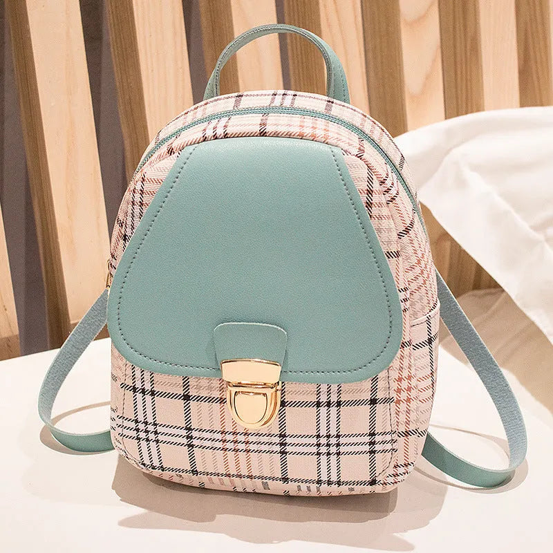 A one-shoulder diagonal phone bag made from PU fabric, shown in one of five colour options.