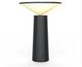 Black USB rechargeable LED desk lamp with touch sensor on a wooden desk, showing its adjustable lamp head.