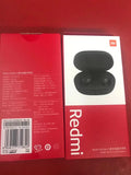 Redmi AirDots Black true wireless earbuds and charging case on a white background.