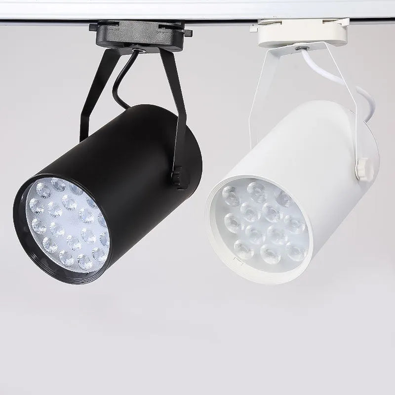 LED track spotlight with open-mounted slide design on black aluminium shell