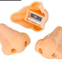 Flesh colour plastic pencil sharpener with geometry shape