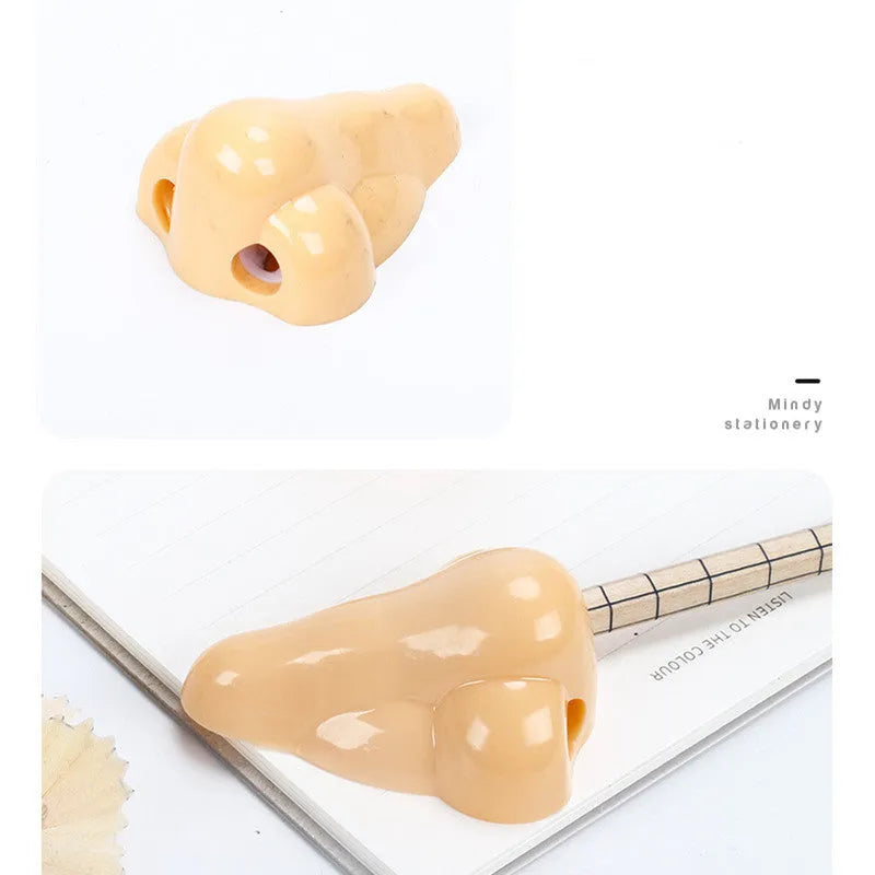 Flesh colour plastic pencil sharpener with geometry shape
