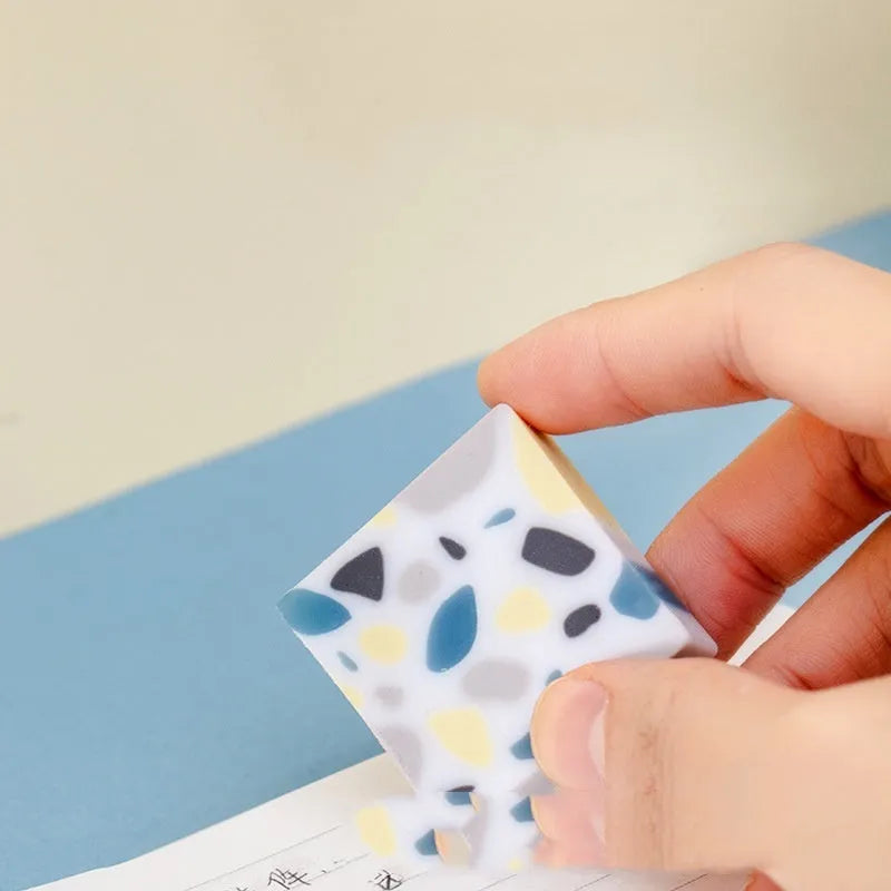 Brick-shaped rubber eraser for student pencil correction on paper