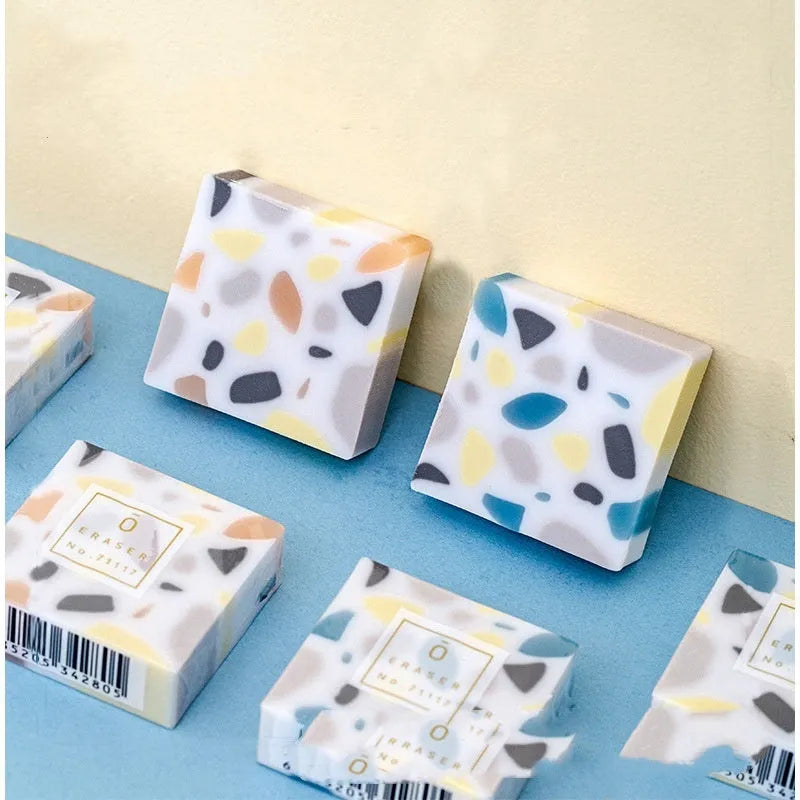 Brick-shaped rubber eraser for student pencil correction on paper